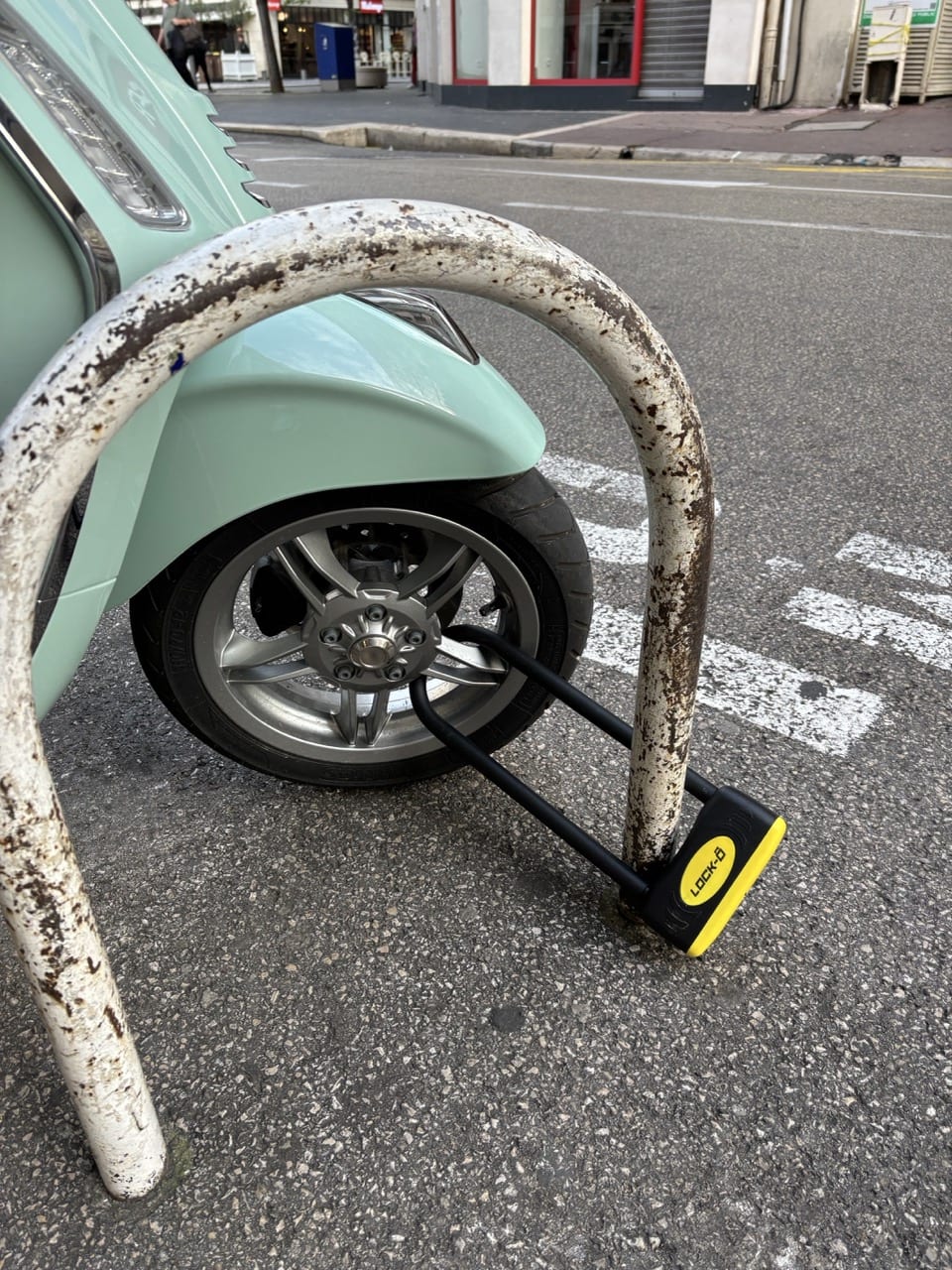 How should I park and secure the scooter?